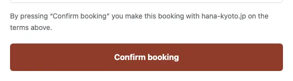 The Confirm booking button, in the property colour.